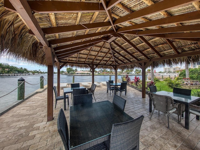 view of patio / terrace with a gazebo and a water view