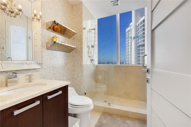 bathroom featuring an enclosed shower, toilet, and tasteful backsplash