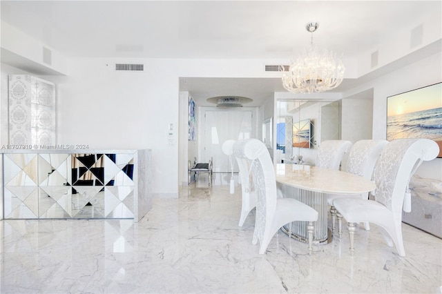 dining area with a notable chandelier