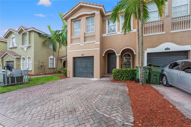 view of front of property with a garage