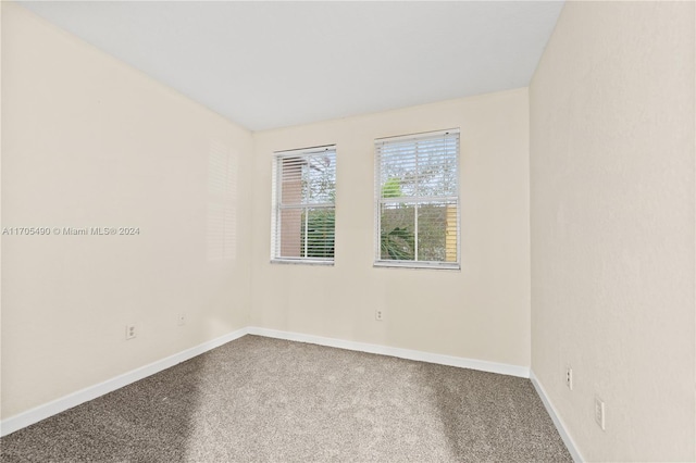 unfurnished room featuring carpet floors