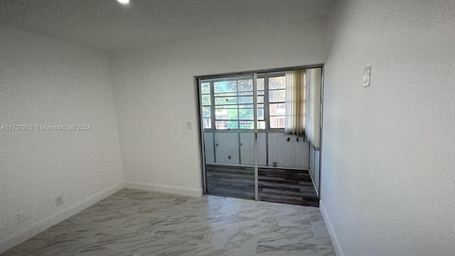 entryway featuring a textured ceiling