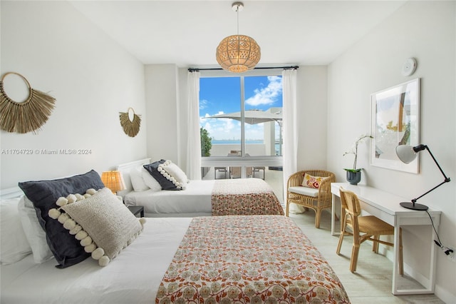 bedroom with light hardwood / wood-style floors