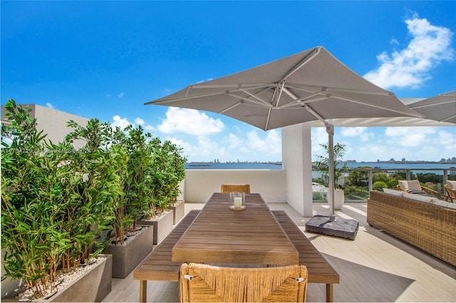 view of patio featuring a water view