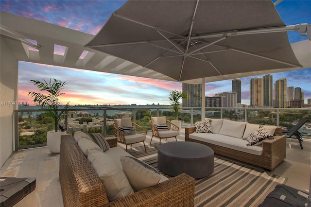 patio terrace at dusk with an outdoor hangout area