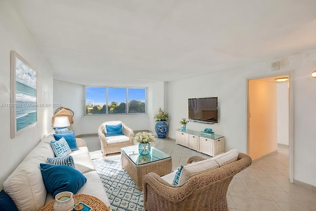 living room with light tile patterned floors