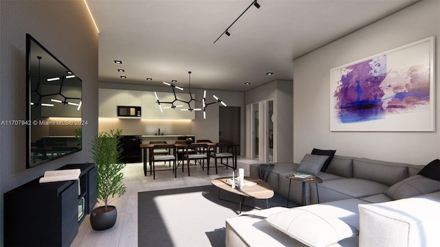 living room featuring hardwood / wood-style flooring and sink