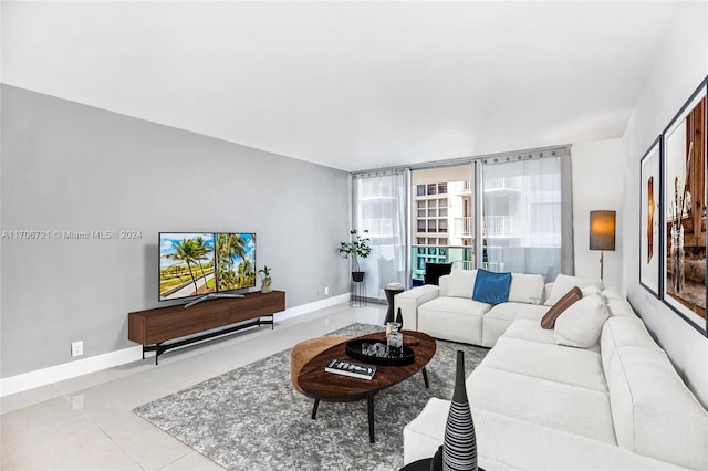 living room with light tile patterned flooring