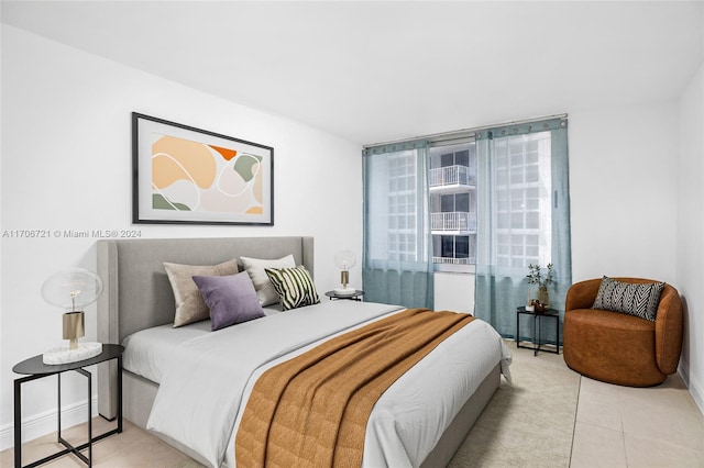 bedroom with light tile patterned flooring