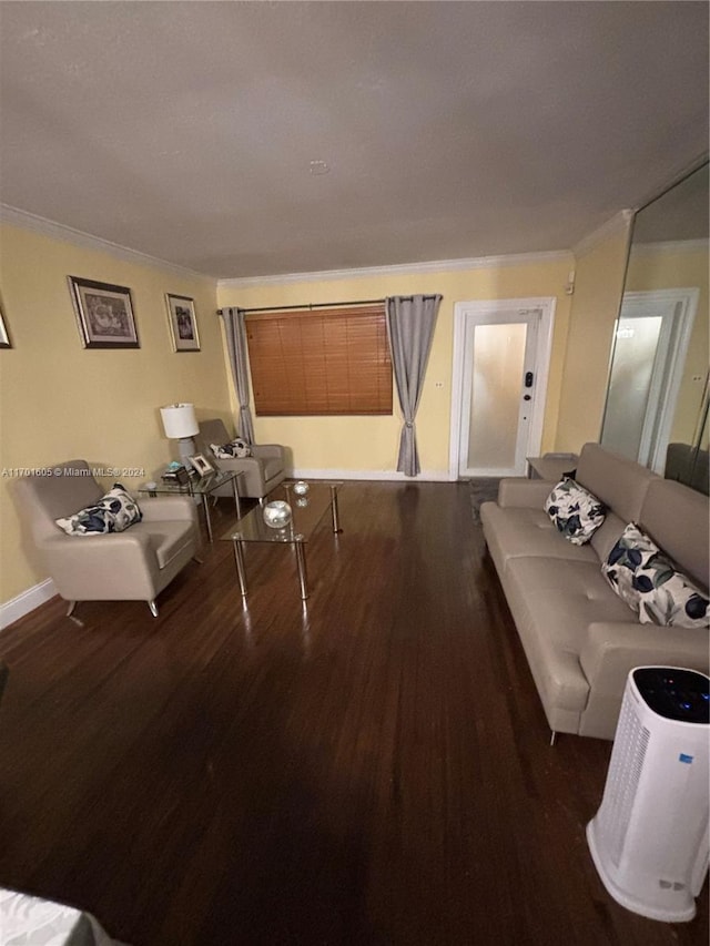 living room featuring hardwood / wood-style flooring and ornamental molding