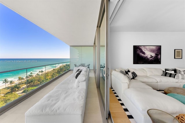 balcony with a view of the beach and a water view