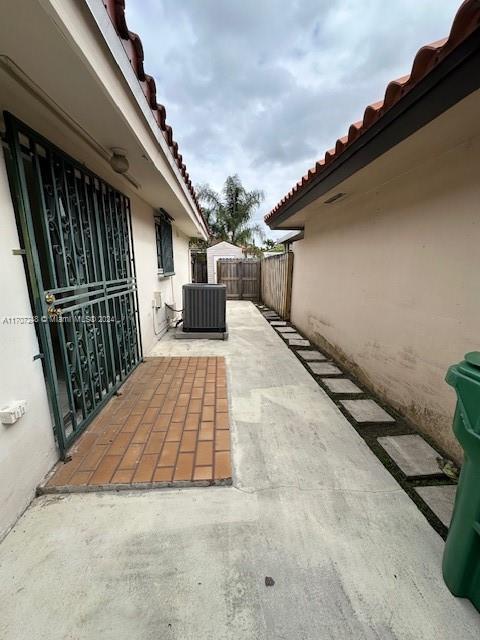 view of patio featuring central air condition unit