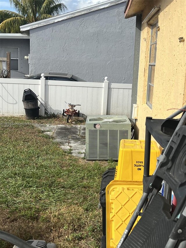 4575 Gladiator Cir, Green Acres, FL 33463 - view of yard with cooling unit