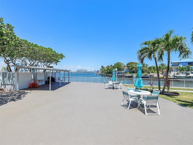 view of patio / terrace with a water view