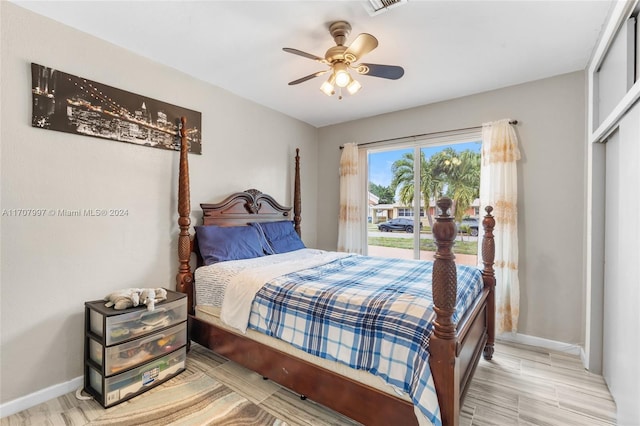 bedroom with ceiling fan, a closet, and light hardwood / wood-style flooring