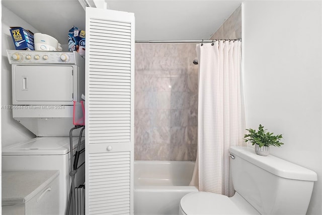 bathroom featuring stacked washer / dryer, shower / tub combo with curtain, and toilet