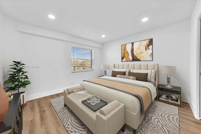 bedroom with wood-type flooring