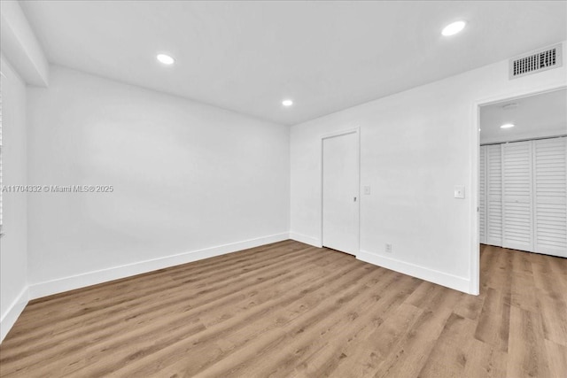 1200 SW 130th Ave Unit 412G, Pembroke Pines, FL 33027 - unfurnished bedroom featuring recessed lighting, baseboards, and light wood-type flooring