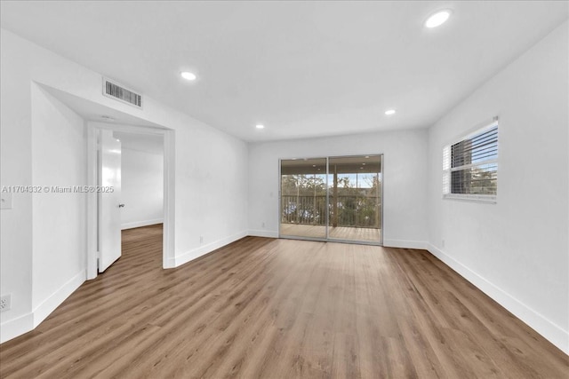 1200 SW 130th Ave Unit 412G, Pembroke Pines, FL 33027 - spare room featuring baseboards, wood finished floors, and recessed lighting