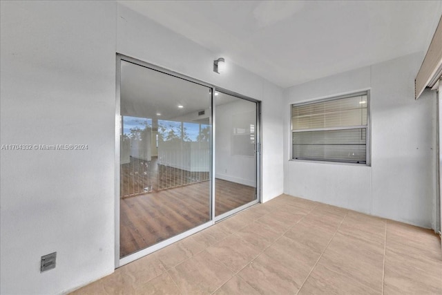 interior space featuring a closet and light hardwood / wood-style flooring