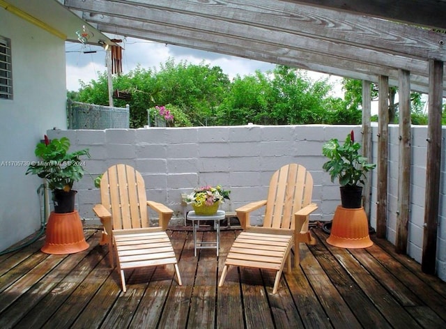 wooden terrace featuring a pergola