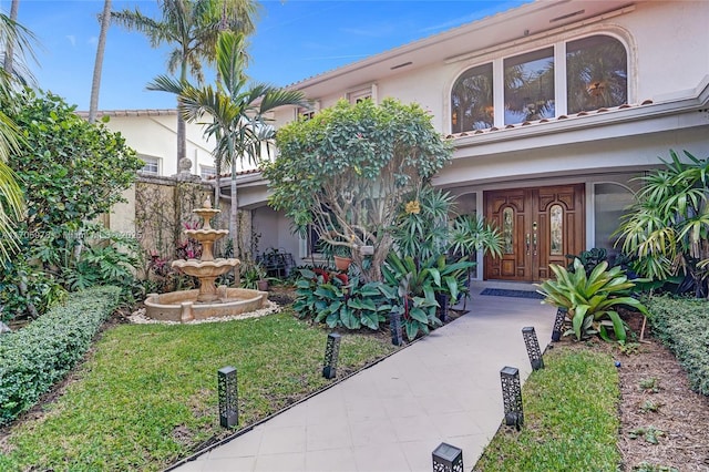 1960 NE 118th Rd, North Miami, FL 33181 - view of front facade featuring stucco siding
