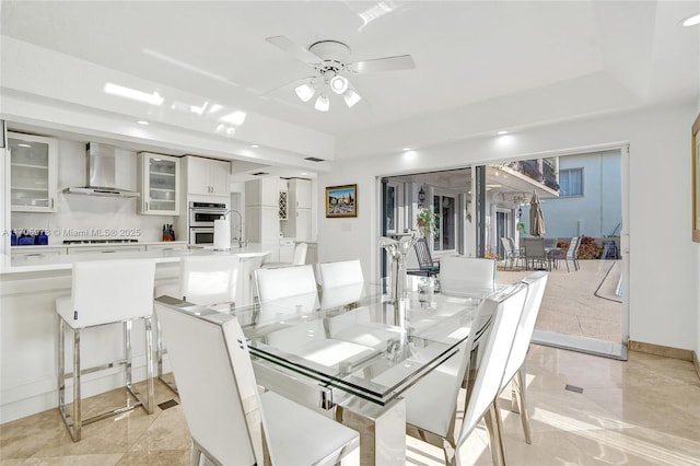 1960 NE 118th Rd, North Miami, FL 33181 - dining space with ceiling fan, recessed lighting, a raised ceiling, and baseboards