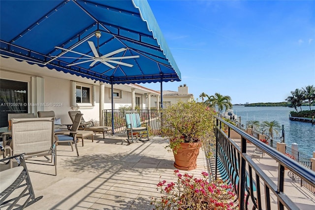 view of patio / terrace with a water view