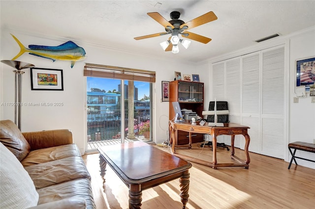 1960 NE 118th Rd, North Miami, FL 33181 - office area featuring light wood-type flooring, ornamental molding, and a ceiling fan