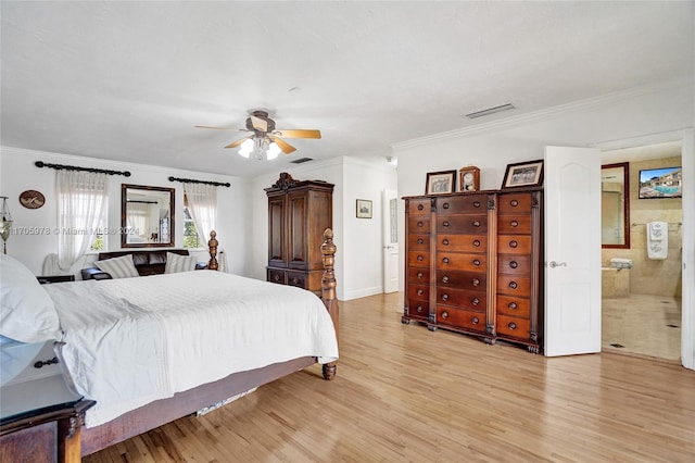 bedroom with ceiling fan, light hardwood / wood-style floors, ornamental molding, and ensuite bathroom