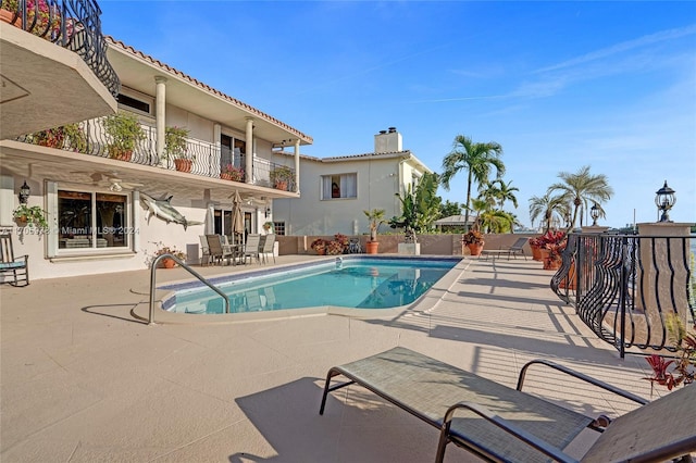 view of pool with a patio area