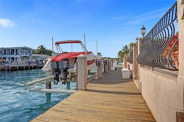 dock area featuring a water view