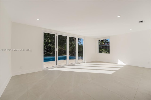 view of tiled spare room