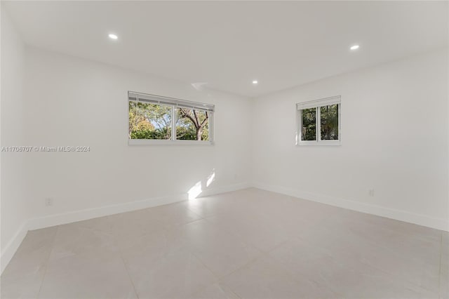 empty room featuring a wealth of natural light