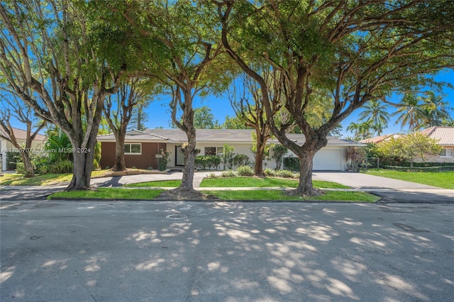 ranch-style home with a garage