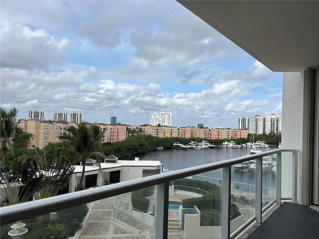 balcony featuring a water view