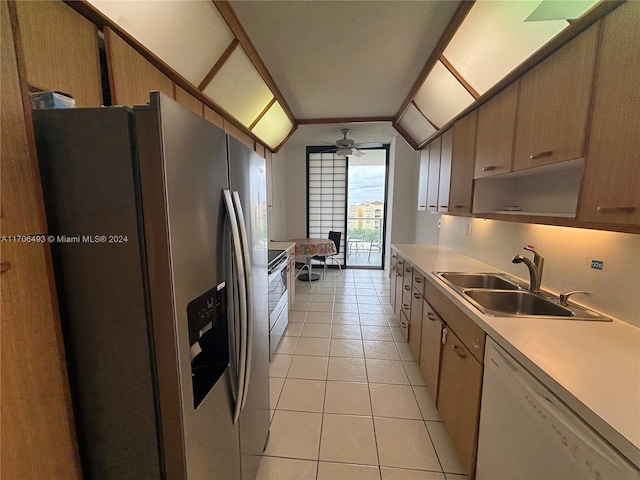 kitchen with ceiling fan, sink, dishwasher, stainless steel fridge with ice dispenser, and electric stove