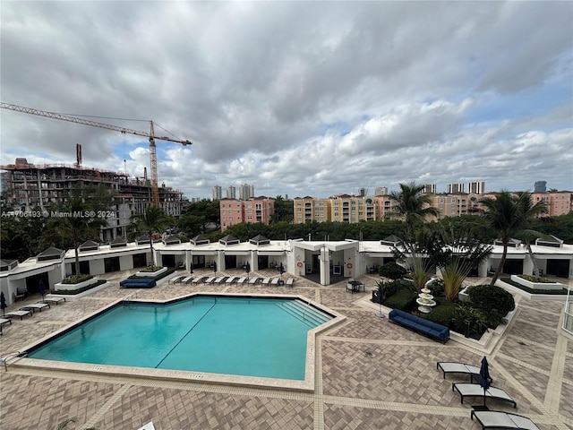 view of swimming pool featuring a patio area