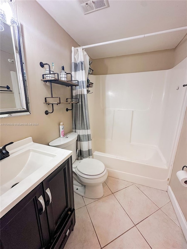 full bathroom featuring shower / bathtub combination with curtain, tile patterned flooring, vanity, and toilet