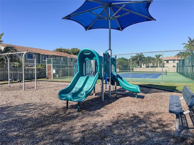 view of playground with tennis court