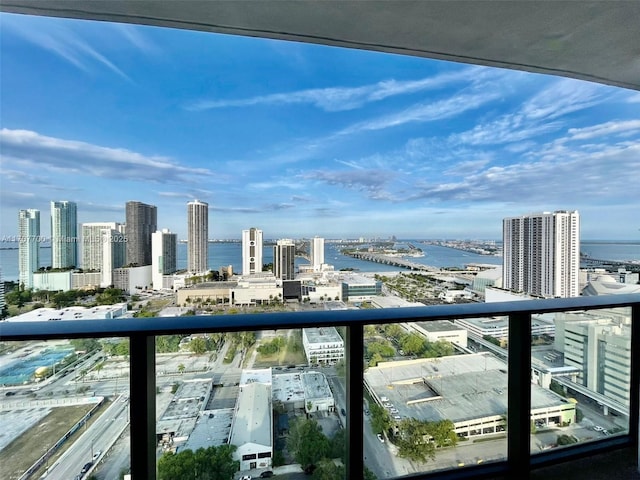 balcony featuring a water view