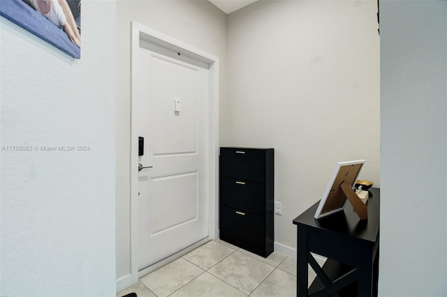 view of tiled foyer entrance