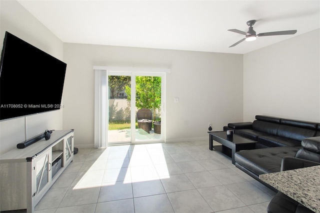 living room with light tile patterned floors and ceiling fan