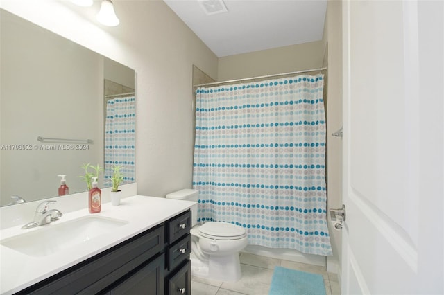 full bathroom featuring tile patterned flooring, vanity, toilet, and shower / bath combo with shower curtain