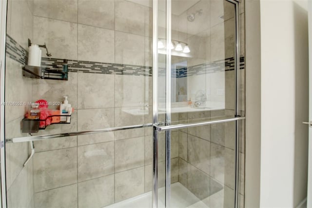 bathroom with an enclosed shower