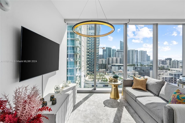 living room with floor to ceiling windows