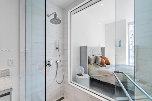 bathroom with vanity and an enclosed shower