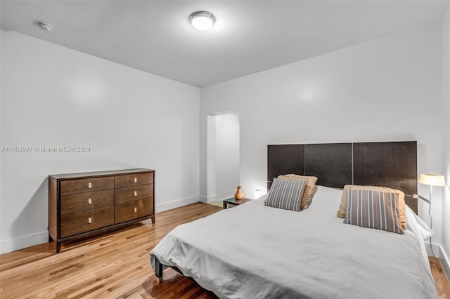 bedroom with light hardwood / wood-style floors