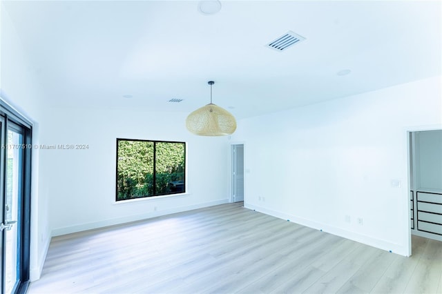 unfurnished living room featuring light hardwood / wood-style floors