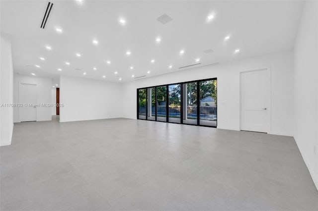 6401 SW 84th St, South Miami, FL 33143 - spare room featuring concrete flooring